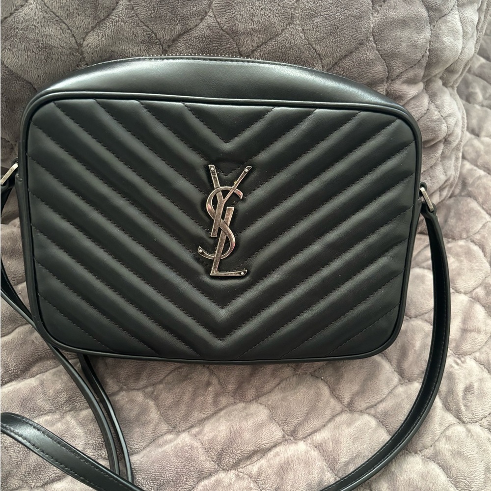 YSL pocket book practically brand new. used twice. No blemishes.